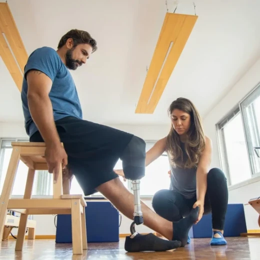 man getting a fitting for prosthetic leg